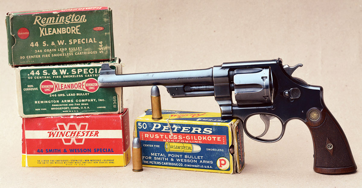 The Smith & Wesson 1st Model Hand Ejector or Triple Lock was the first N-frame; however, the cylinder was not heat-treated, which explains why ammunition  factories kept pressures low for the 44 Special.